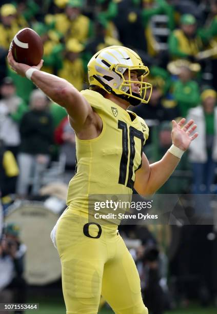Quarterback Justin Herbert of the Oregon Ducks passes the ball during the first half of the game against the Oregon State Beavers at Reser Stadium on...