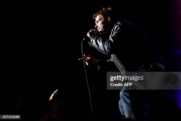 British singer-songwriter Damon Albarn performs on stage with his band "Gorillaz" on November 22, 2010 at the Zenith music hall in Paris. AFP PHOTO...