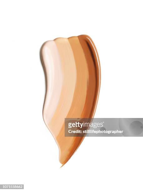 creative cosmetic brown cream smear on white background - toned image 個照片及圖片檔