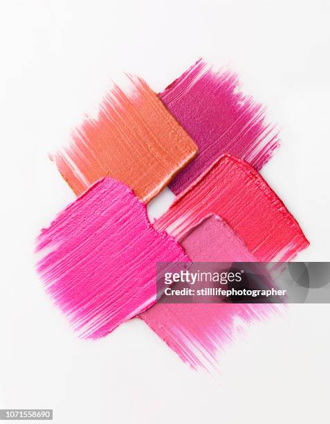 creative cosmetic smear on white background - lipstick smudge imagens e fotografias de stock
