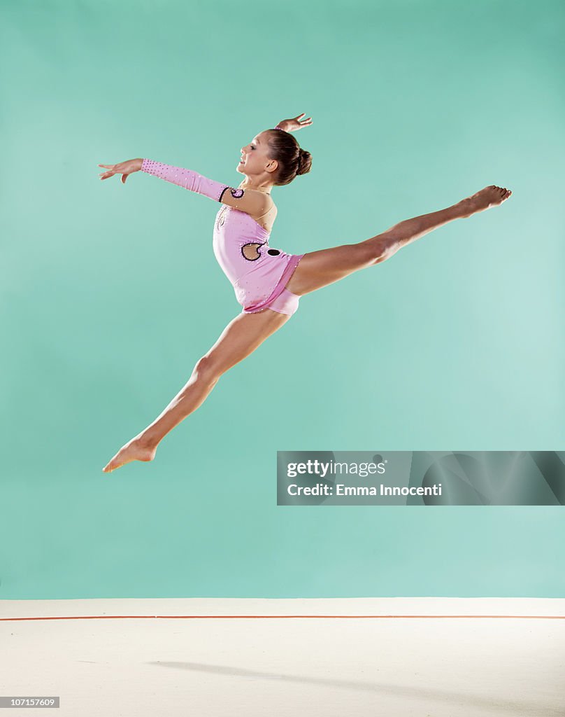 Leotards Split Rips Gymnast Mid Air Split Pink Leotard High-Res Stock Photo - Getty Images