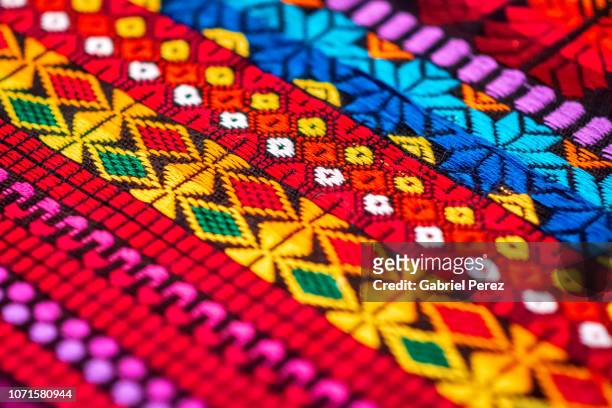 a colorful textile from chiapas, mexico - lateinamerika stock-fotos und bilder