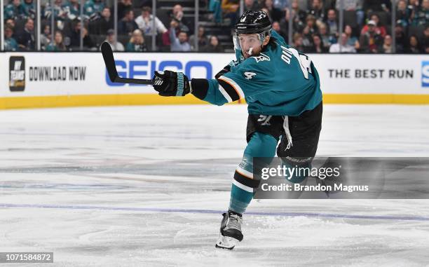 Brenden Dillon of the San Jose Sharks takes a shot on goal against the New Jersey Devils at SAP Center on December 10, 2018 in San Jose, California