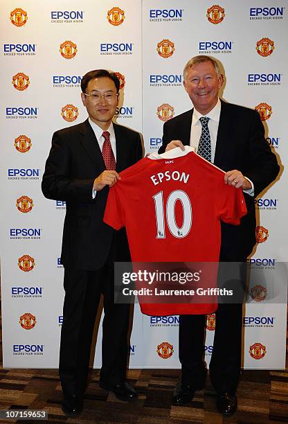 Sir Alex Ferguson of Manchester United with Epson Global President Mr Minoru Usui during a Press Conference as Manchester United launch a new...