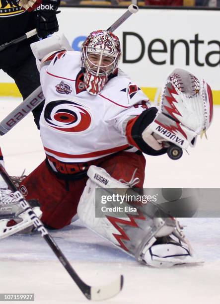 Cam Ward of the Carolina Hurricanes stops a shot in the first period against the Boston Bruins on November 26, 2010 at the TD Garden in Boston,...
