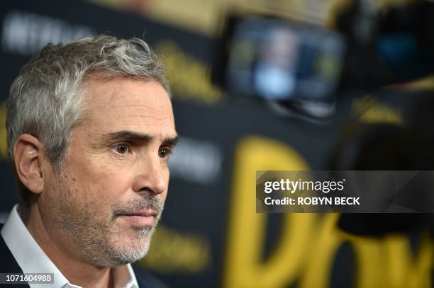 Mexican director Alfonso Cuarón arrives for the Los Angeles premiere of "Roma" at the Egyptian theatre in Hollywood on December 10, 2018.