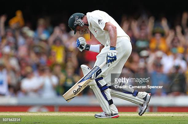 Michael Hussey of Australia celebrates scoring a century during day three of the First Ashes Test match between Australia and England at The Gabba on...