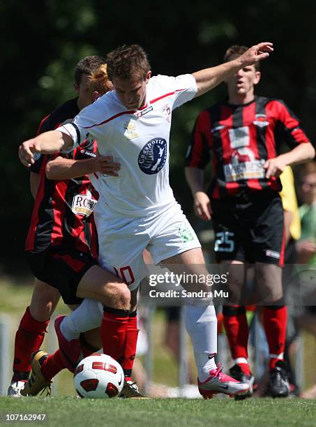 Aaron Clapham of Canterbury and Allan Pearce of Waitakere contest for the ball during the ASB Premiership match between Waitakere and Canterbury at...