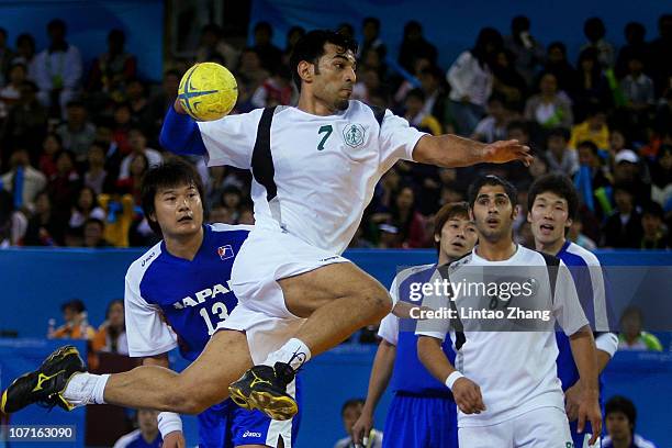 Masoud Zohrabi of Iran competes in the Men's Gold Medal Match at Huashi Gymnasium during day fourteen of the 16th Asian Games Guangzhou 2010 on...