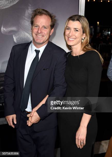 Bradley Thomas and his wife Isabelle Thomas arrive at the premiere of Warner Bros. Pictures' "The Mule" at the Village Theatre on December 10, 2018...