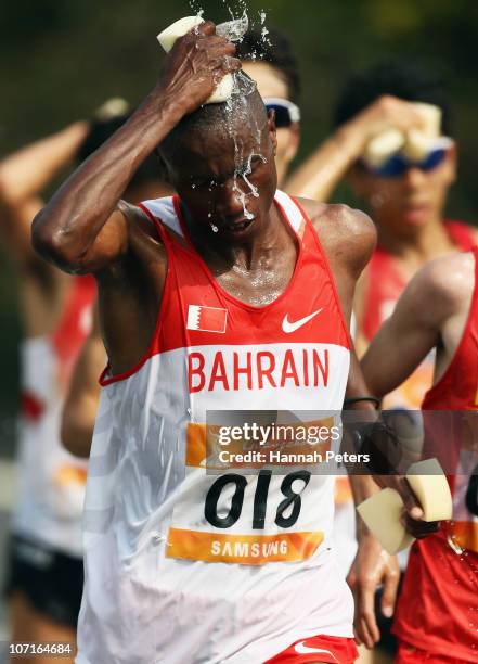 Khalid Kamal Khalid Yaseen of Bahrain competes in the Men's Marathon at Triathlon Venue during day fifteen of the 16th Asian Games Guangzhou 2010 on...
