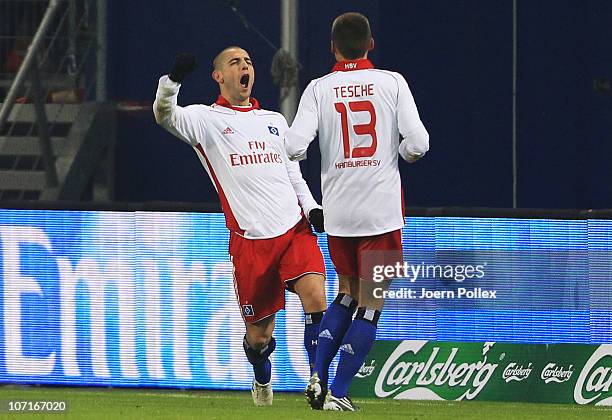 Mladen Petric of Hamburg celebrates after scoring his team's third goal during the Bundesliga match between Hamburger SV and VfB Stuttgart at Imtech...