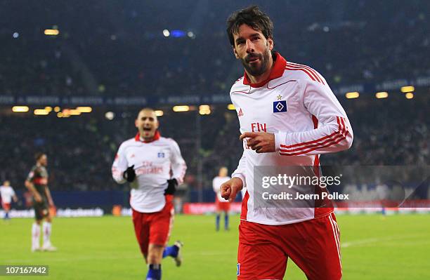 Ruud van Nistelrooy of Hamburg celebrates after scoring his team's fourth goal during the Bundesliga match between Hamburger SV and VfB Stuttgart at...