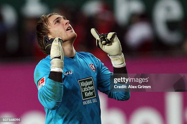 Goalkeeper Tobias Sippel of Kaiserslautern celebrates after team mate Srdjan Lakic scored his team's third goal during the Bundesliga match between...