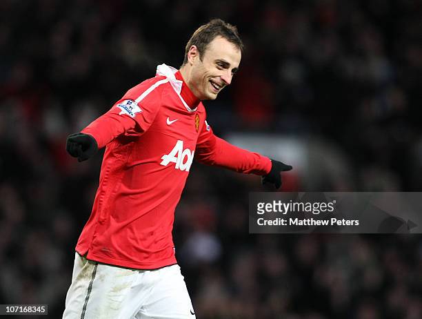 Dimitar Berbatov of Manchester United celebrates scoring their fourth goal during the Barclays Premier League match between Manchester United and...
