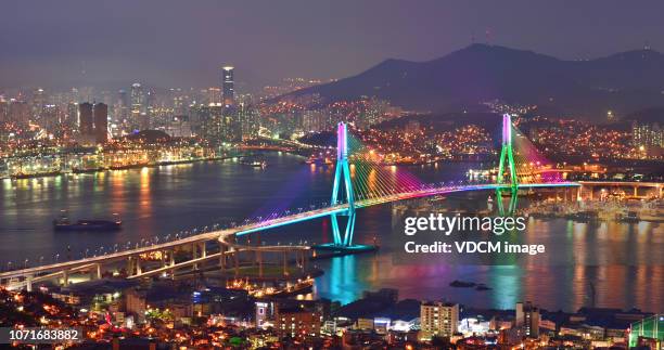 night view of busan north bridge grand bridge vd713 - kor stock pictures, royalty-free photos & images