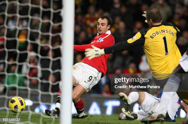 Dimitar Berbatov of Manchester United scores their seventh goal during the Barclays Premier League match between Manchester United and Blackburn...