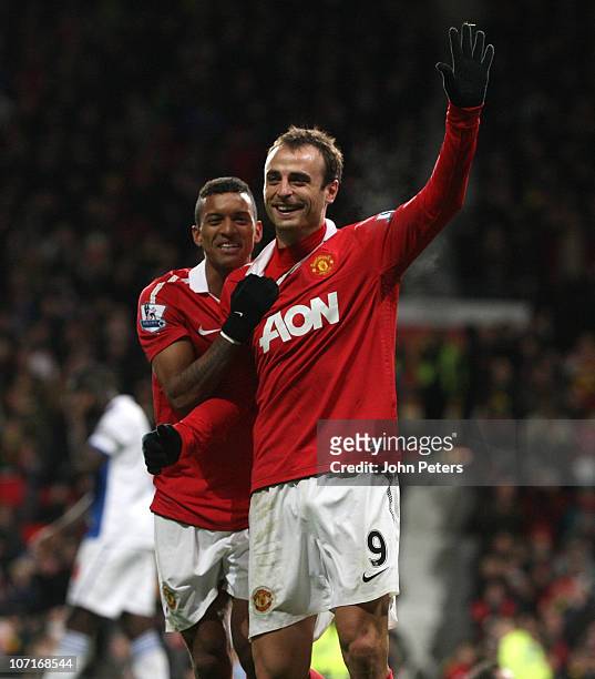 Dimitar Berbatov of Manchester United celebrates scoring their seventh goal during the Barclays Premier League match between Manchester United and...