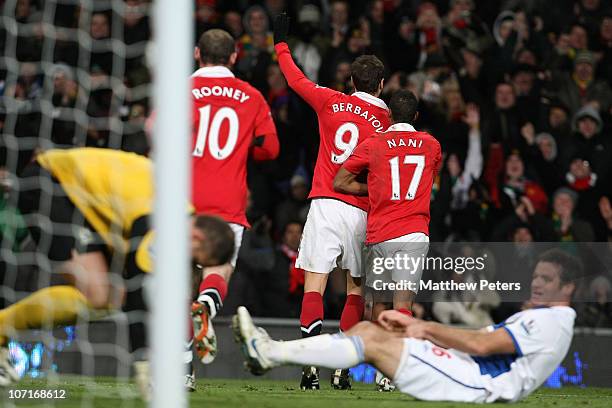 Dimitar Berbatov of Manchester United celebrates scoring their seventh goal during the Barclays Premier League match between Manchester United and...