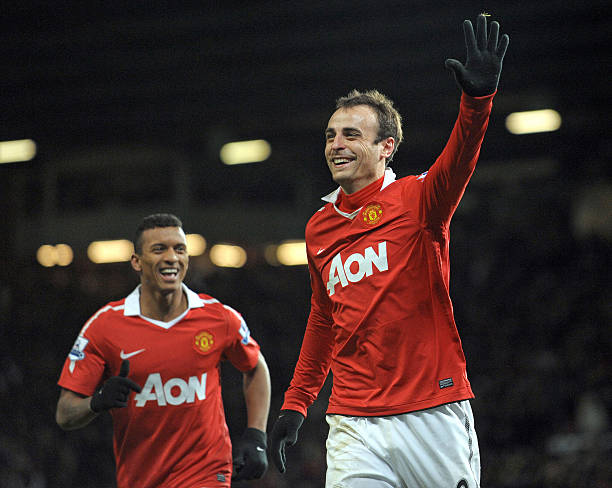 Manchester United's Bulgarian striker Dimitar Berbatov celebrates after scoring his fifth goal during the English Premier League football match...