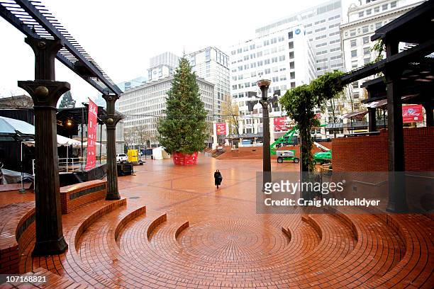 Person walks in Pioneer Courthouse Square, the site of an attempted bombing November 27, 2010 in Portland, Oregon. A Somali-born teenager, Mohamed...