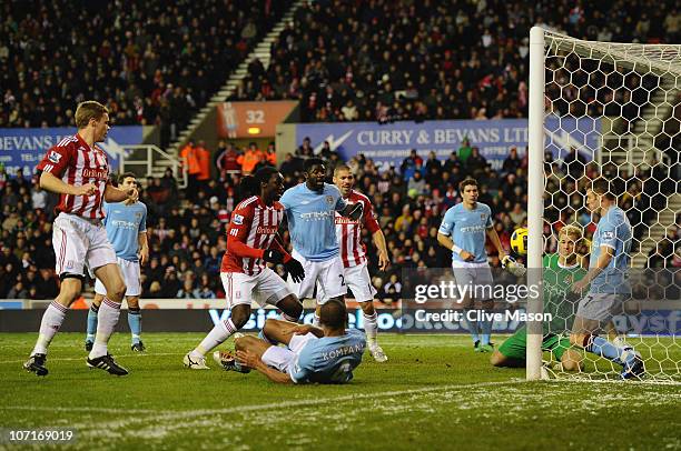 Ryan Shawcross of Stoke City has a shot saved on the line by the Manchester City defence during the Barclays Premiership match between Stoke City and...