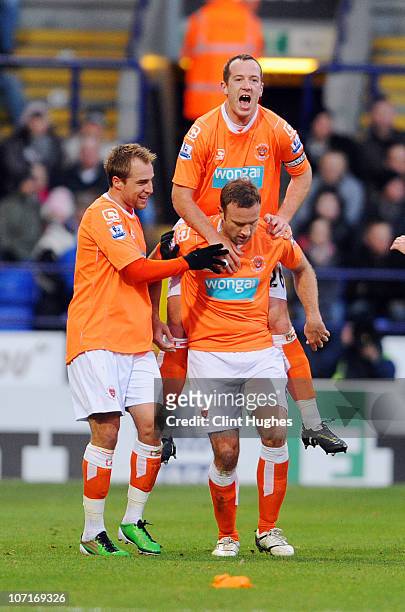 Ian Evatt of Blackpool celebrates with team-mate Charlie Adam after scoring his sides first goal during the Barclays Premier League match between...