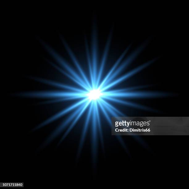 blue light star on black background - shiny stock illustrations