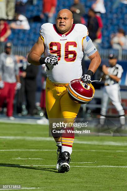 Ma'ake Kemoeatu of the Washington Redskins warms up before a game against the Tennessee Titans at LP Field on November 21, 2010 in Nashville,...