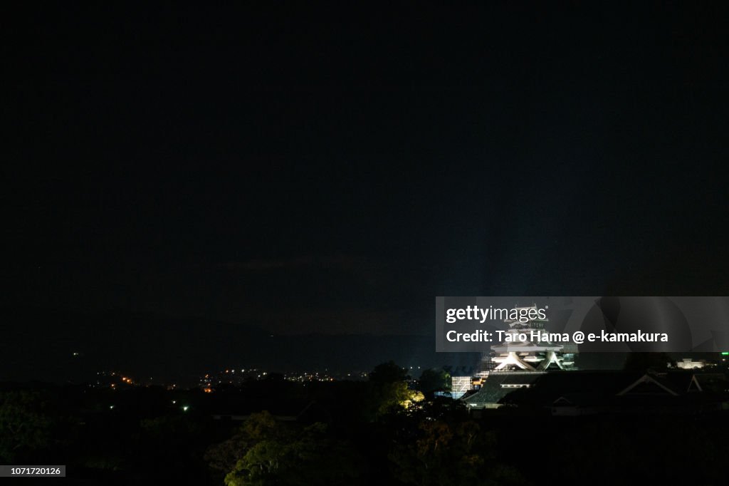 Illuminated Kumamoto Castle in Kumamoto city in Kumamoto prefecture in Japan