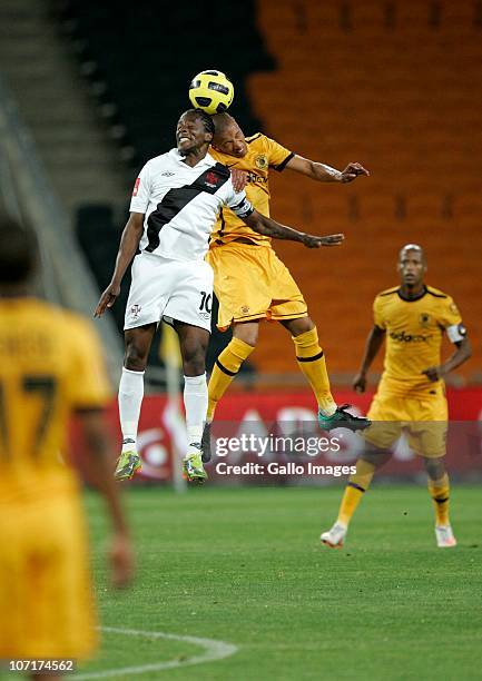 Sibusiso Zuma of Vasco da Gama and Dominic Isaacs jump up for a header during the Absa Premiership match between Kaizer Chiefs and Vasco da Gama at...