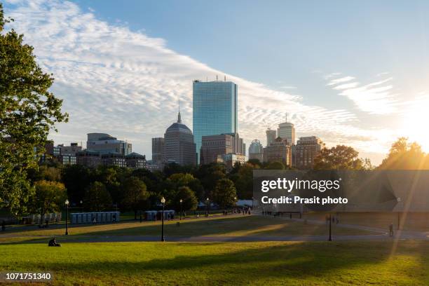 boston back bay skyline at sunset from the boston common hill in massachusetts, usa. - look back at garden cities stock-fotos und bilder