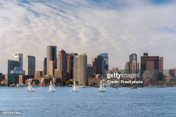 boston skyline with sail boat in massachusetts, usa. - massachusetts landscape stock pictures, royalty-free photos & images