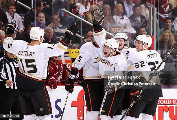 Bobby Ryan of the Anaheim Ducks celebrates with teammates Ryan Getzlaf, Corey Perry and Toni Lydman after Ryan scored his third goal in the third...