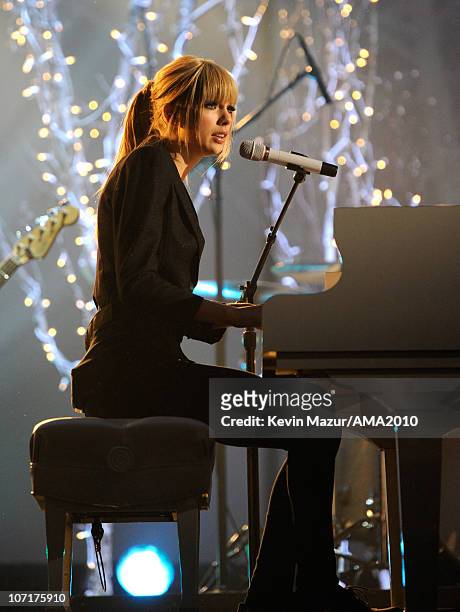 Taylor Swift performs on stage at the 2010 American Music Awards held at Nokia Theatre L.A. Live on November 21, 2010 in Los Angeles, California.