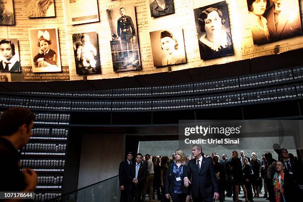 German President Christian Wulff and his daughter Annalena at Hall of Names during a visit at the Yad Vashem Holocaust memorial on November 28, 2010...