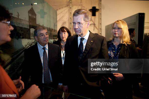 German President Christian Wulff and his daughter Annalena at the Holocaust History Museum during a visit at the Yad Vashem Holocaust memorial on...