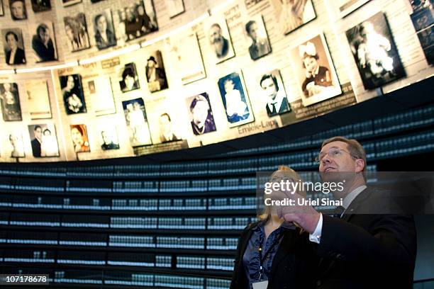 German President Christian Wulff and his daughter Annalena at Hall of Names during a visit at the Yad Vashem Holocaust memorial on November 28, 2010...