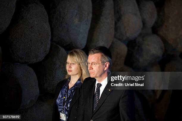 German President Christian Wulff and his daughter Annalena during a visit to the Yad Vashem Holocaust memorial on November 28, 2010 in Jerusalem,...