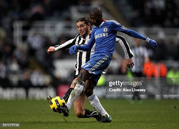 Andy Carroll of Newcastle United battles with Ramires of Chelsea during the Barclays Premier League match between Newcastle United and Chelsea at St...