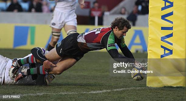 Nick Evans of Harlequins dives over to score a try during the Aviva Premiership match between Harlequins and Leeds Carnegie at The Stoop on November...