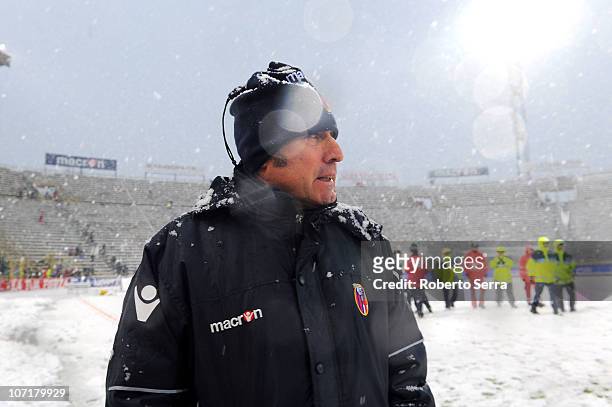 Alberto Malesani, coach of Bologna, walks in the snow as the Serie A match between Bologna and Chievo is cancelled, at Stadio Renato Dall'Ara on...