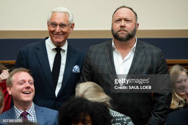 Political Strategist Roger Stone and commentator Alex Jones arrive to hear testimony by Google CEO Sundar Pichai during a House Judiciary Committee...