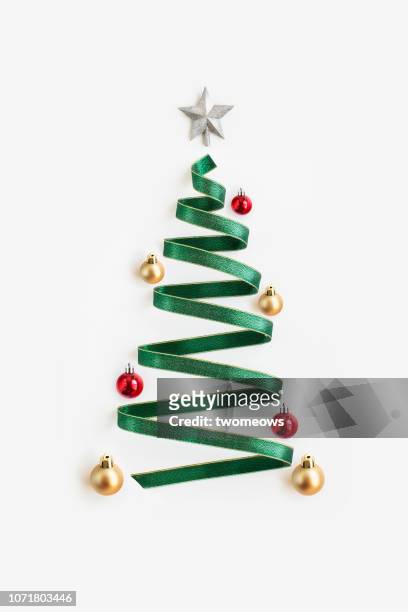 conceptual christmas tree decoration still life. - christmas still life fotografías e imágenes de stock