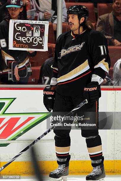 George Parros of the Anaheim Ducks skates on the ice during warm ups prior to the game against the Columbus Blue Jackets during the game on November...