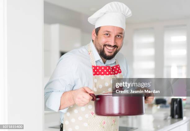 confident chef with dish - apron isolated stock pictures, royalty-free photos & images