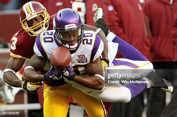 Safety Madieu Williams of the Minnesota Vikings breaks up a pass intended for Anthony Armstrong of the Washington Redskins at FedExField November 28,...