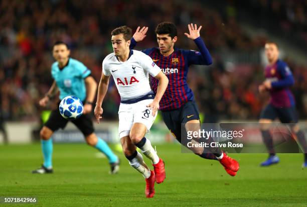 Harry Winks of Tottenham Hotspur evades Carles Alena of Barcelona during the UEFA Champions League Group B match between FC Barcelona and Tottenham...