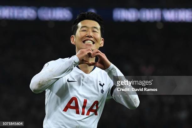 Heung-Min Son of Tottenham Hotspur celebrates after scoring his team's third goal during the Premier League match between Tottenham Hotspur and...