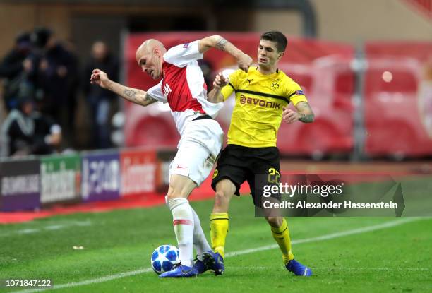 Andrea Raggi of Monaco holds of Christian Pulisic of Borussia Dortmund during the UEFA Champions League Group A match between AS Monaco and Borussia...